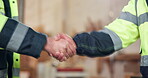 Handshake, construction and team with people in warehouse for project, support and meeting. Architecture, collaboration and thank you with contractor shaking hands for introduction and engineer