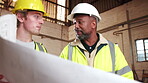 Blueprint, architecture and team with people in warehouse for site plan scale, review or property development. Meeting, renovation project and engineer design with men for expansion and building