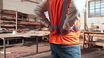 Man, hands and civil engineer on site with back pain, injury or accident with muscle sprain. Contractor, arthritis and construction worker with bad posture for inflammation, sore or spinal bruise.