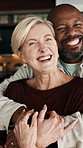 Love, support or interracial couple in house with face, partner care or bonding together in marriage. Smile, loyalty or mature people with embrace, romantic moment or commitment in happy relationship