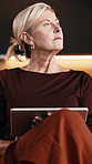 Woman, thinking and remote work in house with tablet, research and inspiration for writing ebook. Mature person, reflection and freelance writer in living room with tech, vision or plan online story.
