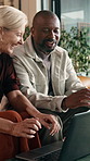 Laptop, laugh or interracial couple with home budget, mortgage planning or typing for finance. Savings, mature man or woman at house with computer for asset growth, investment document and funny joke