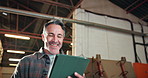 Man, planning and carpenter with tablet in workshop for research with online order confirmation. Technology, thinking and mature woodworker with ideas for timber manufacturing in warehouse from below