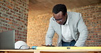 Black man, laptop and drawing on construction site for blueprint, inspection or update planning. Infrastructure, quality control and architect with tech, report or project management for renovation
