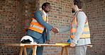 People, handshake and blueprint on construction site for collaboration, inspection or remodeling. Infrastructure, shaking hands and architect team for project management, property or renovation