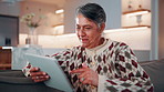 Ebook, search or woman in home with tablet, entertainment or virtual publication on library site. Digital, smile or mature person with tech, multimedia subscription or online reading in living room.