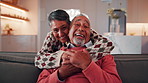 Smile, hug and face of senior couple on sofa in home with love, bonding or connection in marriage. Happy, relax and portrait of elderly woman embracing man in living room with affection in house.