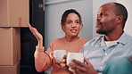 Couple, discussion and moving in new home with coffee, opinion and resolution for interior design issue. Married, mature African people and talk in house with drink, real estate and problem solving.