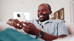 Mature, man and laugh in home with phone, funny online news and humor for social media notification. Happy, black person and browsing on sofa with tech, internet connection or joke from text message.