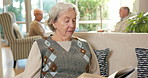 Senior, woman or reading with book in retirement house for literature, knowledge or wisdom. Elderly, female person or novel with story or chapter for information, research or studying in old age home