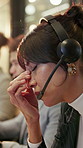 Headache, headset and businesswoman in office for contact us, crm or help desk on terms and conditions. Stress, mic and customer service agent with migraine for assistance, consultation or support.
