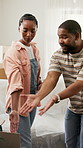Argument, moving and black couple in new home with conflict on real estate error on weekend. Upset, drama and man with woman for toxic relationship with mortgage crisis in kitchen at apartment.