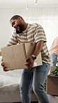 Phone call, box and black man in new house with communication, networking or confirmation of property. Cardboard parcel, cellphone and person on mobile discussion for moving with property investment.