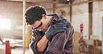 Carpentry, shoulder pain or man in warehouse with massage, muscle issue or fatigue in building project. Accident, overworked or carpenter with discomfort, arm strain or labor injury in woodworking.