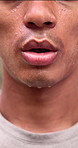 Mouth, man and breathe with fatigue for fitness, cardio exercise and exhaustion from intense training. Tired, male person and sweating with closeup, sports challenge and runner endurance for recovery