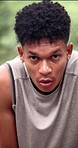 Serious, breathe and face of man outdoor for fitness, exercise and rest for recovery in park. Runner, portrait and person with fatigue, tired and sweating for intense workout, wellness and health