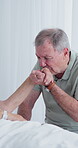 Old couple, holding hands and kiss in clinic, support and compassion for senior partner with illness. Healthcare, recovery and elderly man with spouse, discussion and empathy with gesture in hospital