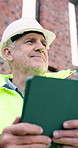 Construction, thinking or man with tablet, site reflection or progress report on building project. Industrial, below or mature engineer with tech, builder perspective or operation plan on digital app