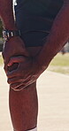 Fitness, hands or massage knee pain outdoor for muscle spasm, tissue overload or runner injury. Athlete, person or tendon discomfort in road for cardio accident, kneecap strain or patellar tendinitis