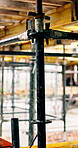 Beam, construction and empty site with scaffolding for building, renovation or structure support. Metal, exterior framework and upgrade project for house extension, civil engineering and development