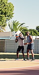 Outdoor, practice and men with basketball, fitness or training for skill development with instructor. Active, athlete and black person with personal trainer, exercise and technique for sport match