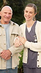 Nurse, smile and help with face of old man outdoor for medical advisor, support and bonding. Caregiver, retirement and empathy with senior person in nature for elderly care, kindness and trust