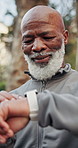 Black man, senior and smart watch with exercise outdoor, monitor health or wellness app with laugh. Retired, timer or stopwatch with runner in park for fitness, tech and happy with training progress