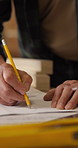 Carpentry, blueprint and hands with sketching, project document and draft of woodworking plan. Timber, man or engineer with drawing, structure design or manufacturing report in furniture building.