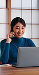 Laptop, phone call and talk with Asian woman in home office, remote work or publication schedule. Author, tech or happy Japanese person with contact for freelance feedback, story or manuscript update