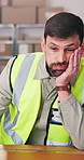 Supply chain, man and frustrated with laptop in warehouse for order mistake, delivery error or brain fog. Logistics, distribution or dispatcher with stress at depot for backlog issue or import crisis