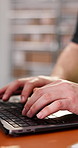 Supply chain, man and hands in depot with laptop, typing report or shipping email for distribution. Logistics, person and browsing in warehouse with tech, courier app or website to track package