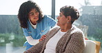 Healthcare, nurse and speaking with old woman on sofa in retirement home for assisted living. Communication, support and visit with caregiver talking to senior patient in apartment for service