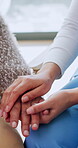 Solidarity, old person or nurse in house with holding hands, understanding or empathy in health assistance. Tender, senior woman or caregiver with comforting, patient support or trust in medical care