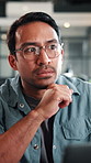 Creative, man and thinking in office with laptop, glasses or brainstorming idea for graphic design. Digital designer, person and reflection in workplace with computer, vision or plan for ad campaign.