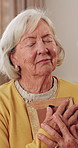 Hug, memories and picture frame with old woman in retirement home for longing or nostalgia. Happy, reflection and remember with senior person embracing photograph for emotions or love as widow 