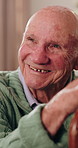 Happy, thinking and senior man in home with reflection, nostalgia or memory of retirement. Smile, walking stick and elderly person in living room with ideas, remember or planning for pension in house