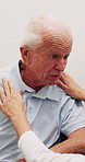 Dressing, help and nurse with senior man in retirement home for assisted living or elderly care. Assistance, collar or getting ready with caregiver and old person in bedroom for aid or service