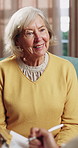 Psychology, senior and talking with happy woman in therapy office for help, healing and rehabilitation. Counseling, psychiatry or old person with smile, mental health recovery or writing on clipboard