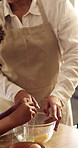 Hands, mom and child with egg for baking, cake mixture and teaching family recipe in home. Mother, kid and mixing bowl with raw ingredients for cookies preparation, culinary development and bonding