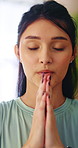 Meditation, prayer hands or woman in home with breathing, calm practice or mindfulness in yoga activity. Inner peace, wellness or person with namaste, zen or mindset improvement for holistic health.
