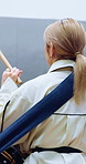 Woman, drum and music with taiko group in studio for practice rehearsal, Japanese culture and back. Person, drummer and band with percussion instrument for performance, traditional heritage or rhythm