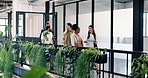 Walk, discussion and business people in office for property development, feedback or proposal. Conversation, broker and realtor in hallway for planning, teamwork or valuation at real estate agency