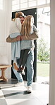 Front door, home and children running to dad for hug, welcome and greeting for arrival or return from work. Happy man, girl kids or daughters in family house with love, care or reunion with safety
