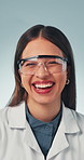 Face, laughing and science with woman in studio for development, innovation or research. Funny, goggles and reaction with excited scientist on gray background for health or pharmaceutical industry