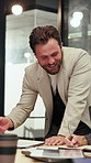 Team, meeting and happy man with documents in office, talk and plan for case with legal information. Attorney, collaboration and people with paperwork, writing and discussion for trial in law firm