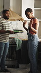 Fight, black couple and painting for home renovation, argument and interior design with problem. Angry, house remodeling and man with woman for property maintenance disagreement, dispute and mistake