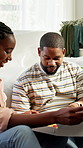 Couple, relax and moving in new home with pizza, sharing takeaway or bonding together for relocation. Married, hungry black people and happy homeowner with fast food, boxes or first meal in apartment