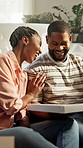 Couple, laugh and moving in home with pizza, funny conversation or bonding together for relocation. Married, hungry black people and happy homeowner with fast food, joke and first meal in new house.