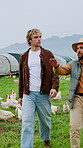 Agriculture, men and walking with tablet on chicken farm for flock health, monitor growth or inspection. Poultry industry, farmer and conversation with app for egg production or livestock update