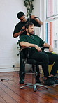 Barber, man and brush in salon with blow dry, grooming service and cosmetic tools for maintenance. People, hairdresser and hairdryer with technique for hairstyle, appointment and customer makeover.